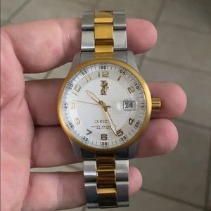 Gold and silver Invicta watch